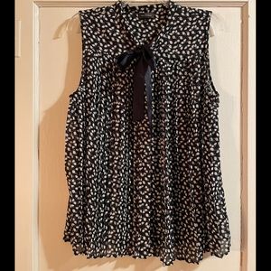 Navy and white polka dot tank